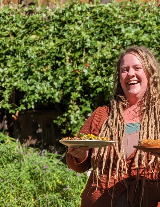 Kale holding two platters